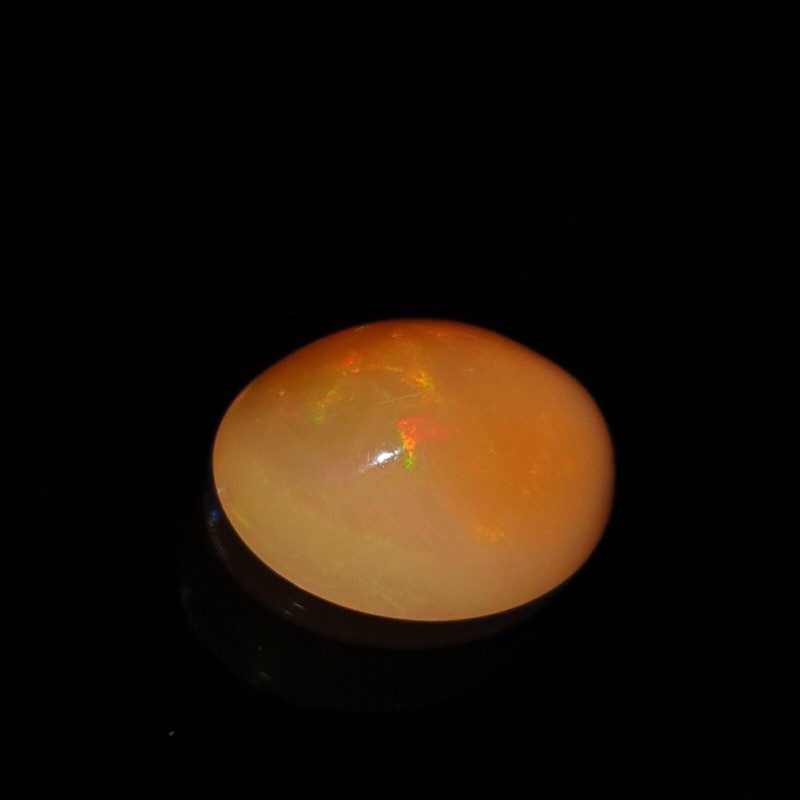 Natural Ethiopian Opal With Stainless Fire Oval Shape Cabochon Loose Gem 5.70 Ct gallery