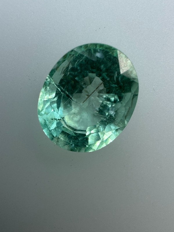 0.70 Carat, Bright Bluish Green 6 x 5mm Oval. Copper Bearing PARAIBA TOURMALINE gallery
