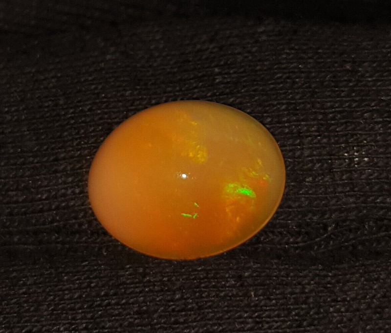 Natural Ethiopian Opal With Stainless Fire Oval Shape Cabochon Loose Gem 5.70 Ct gallery