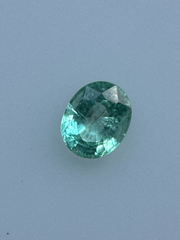 0.70 Carat, Bright Bluish Green 6 x 5mm Oval. Copper Bearing PARAIBA TOURMALINE gallery