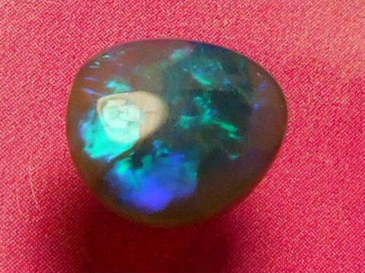 Beautiful Rolling Pretty Dark Colour Pattern Solid Black Opal 1.76 carat.