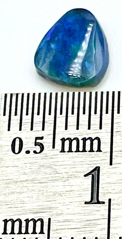 0.80ct natural solid Black Opal, origin Lightning Ridge Australia, 7.5mm x 6.6mm gallery