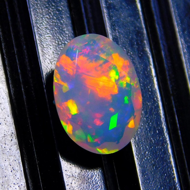 Top AAA Quality Faceted Ethiopian Opal Gemstone Size 10x7x4mm 1.3Cts gallery