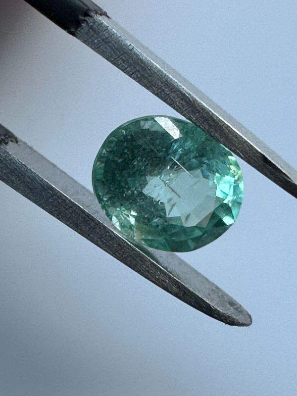 0.70 Carat, Bright Bluish Green 6 x 5mm Oval. Copper Bearing PARAIBA TOURMALINE gallery