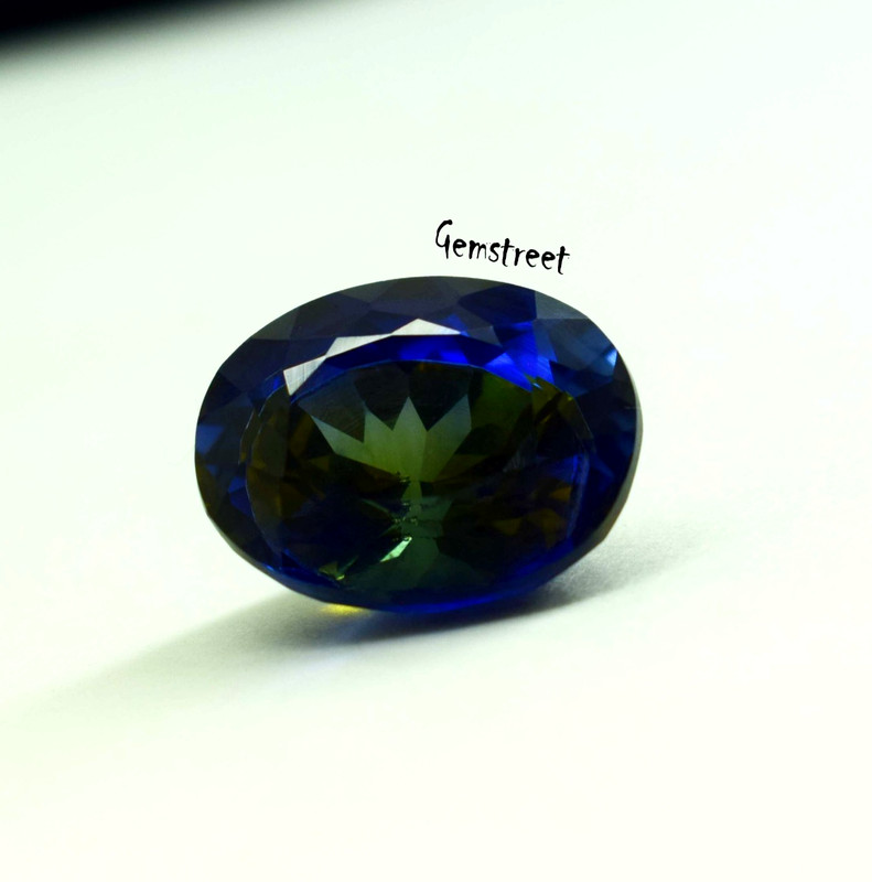 Stunning 12-14 Ct Pitambari Sapphire Oval Cut Natural Green to Blue Bi-Color Gem