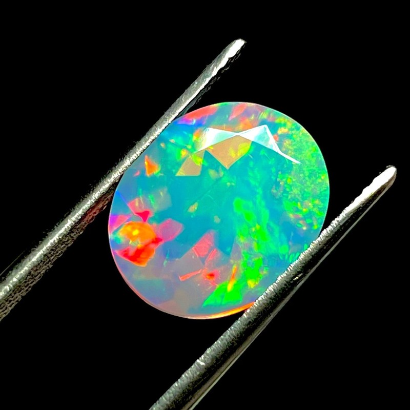 AAA+ Quality Faceted Ethiopian Opal 12x10x6.35-MM Oval Loose Gemstone (E-141)