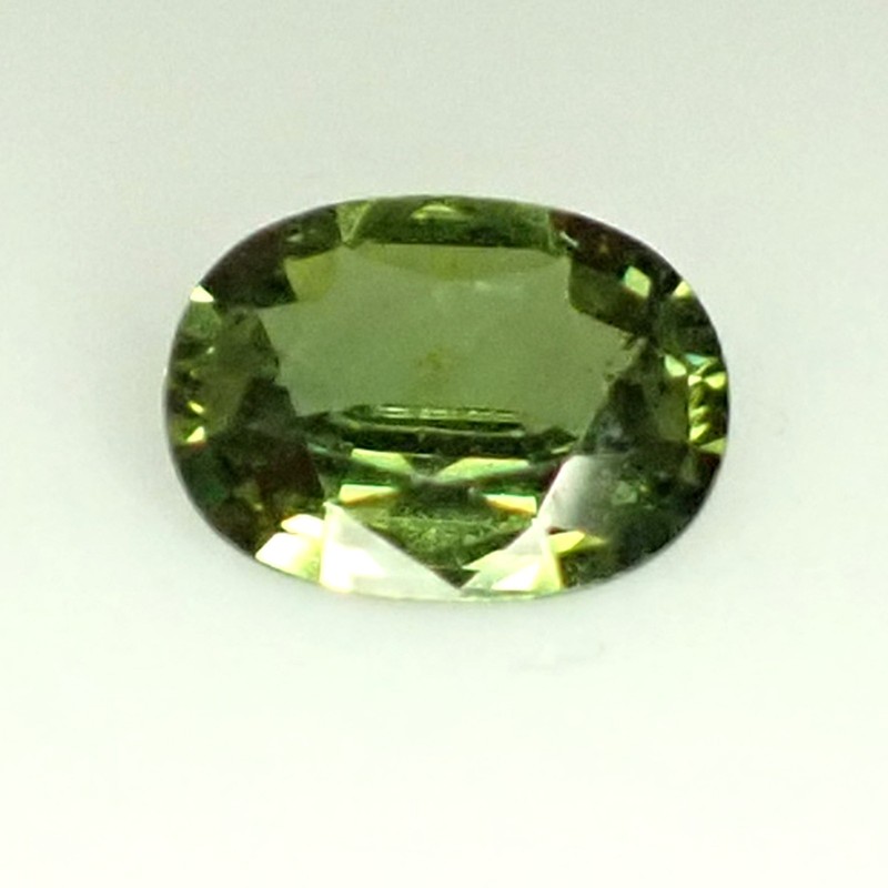 0.55 ct Oval 6.1 x 4.5 mm Dark Green Color Natural Australian Parti Sapphire