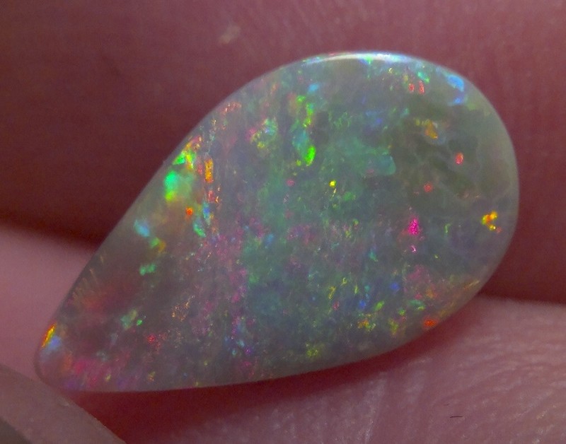 0.92ct Solid Lightning ridge opal, with stunning rainbow fire * see video* gallery