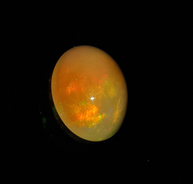 Natural Ethiopian Opal With Stainless Fire Oval Shape Cabochon Loose Gem 5.70 Ct