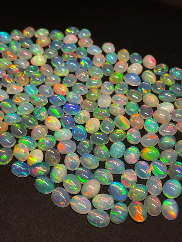 100 Pieces Lot Natural Ethiopian Opal Oval Cabochon Welo Multi Fire Opals 6-9 mm