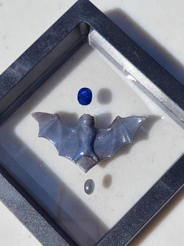 25 TCW Natural Sapphire Bat Carving 1.55 TCW Blue Sapphire .50 TCW Alexandrite