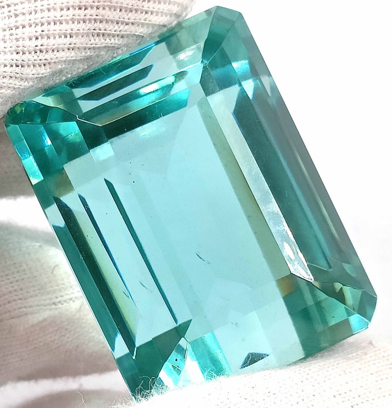 210 CARAT GLAMOROUS NEON BLUE APATITE EGL CERTIFIED EMERALD CUT LOOSE GEMSTONE gallery