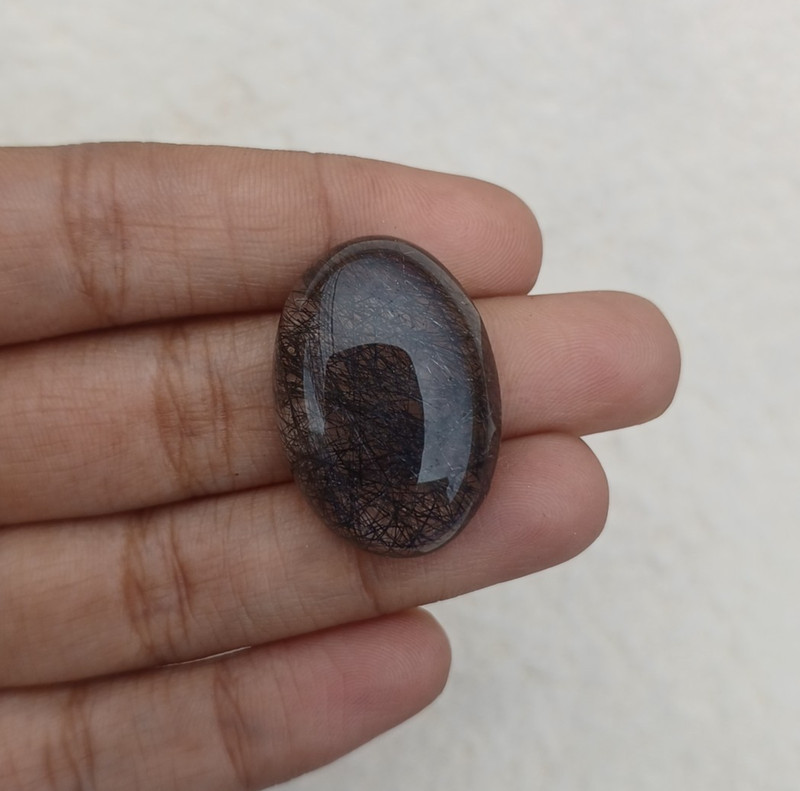 Natural Black Rutile Oval 27x19x7mm Approx 30.20Cts AMJ676