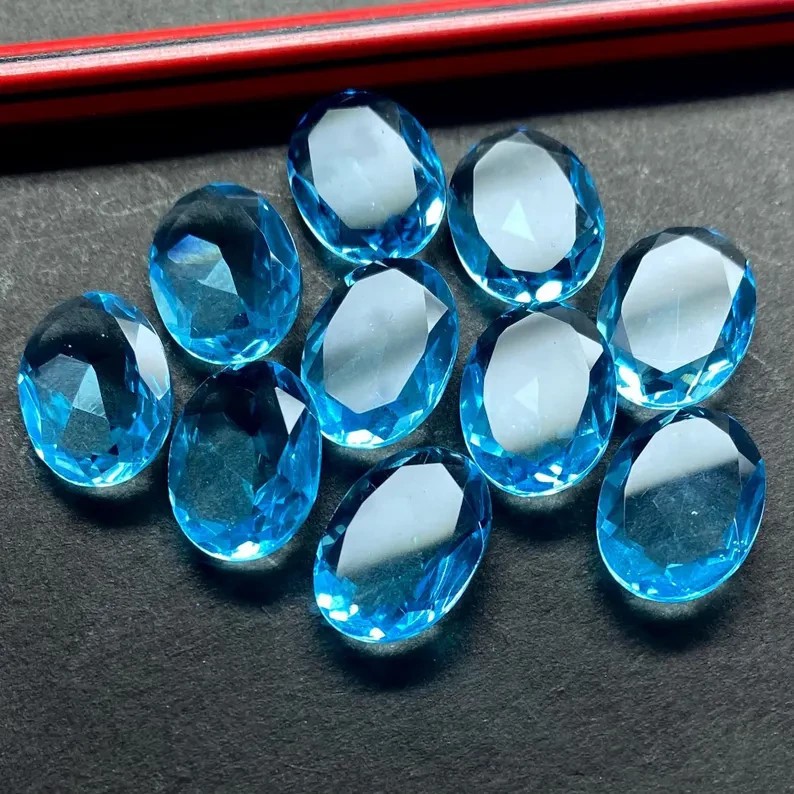 [WHOLESALE] SWISS BLUE GLASS FIELD TOPAZ FACETED OVAL SHAPE LOOSE GEMSTONE