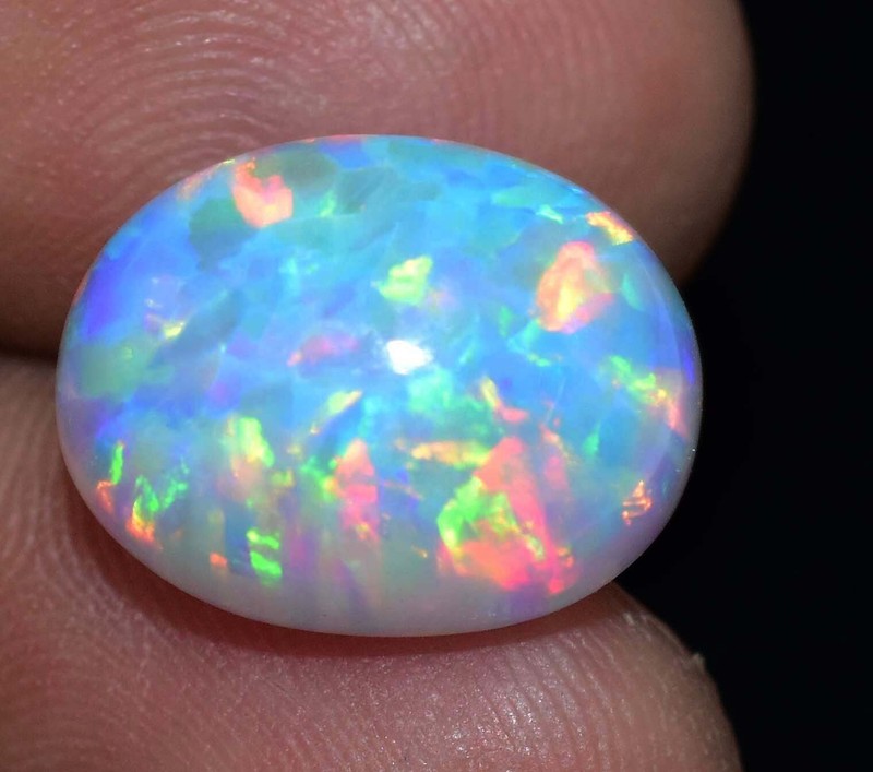 Natural Ethiopian Fire Opal 8.15 CT Certified Play Of Color 14 X 11 MM Gemstone gallery