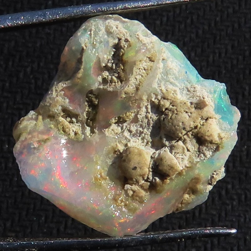 NATURAL PLAY OF COLOR ETHIOPIAN OPAL ROUGH GEMSTONE 8.10 Cts. (16X17X07 mm) N_04
