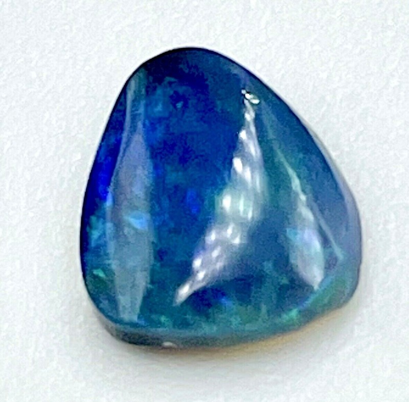0.80ct natural solid Black Opal, origin Lightning Ridge Australia, 7.5mm x 6.6mm gallery