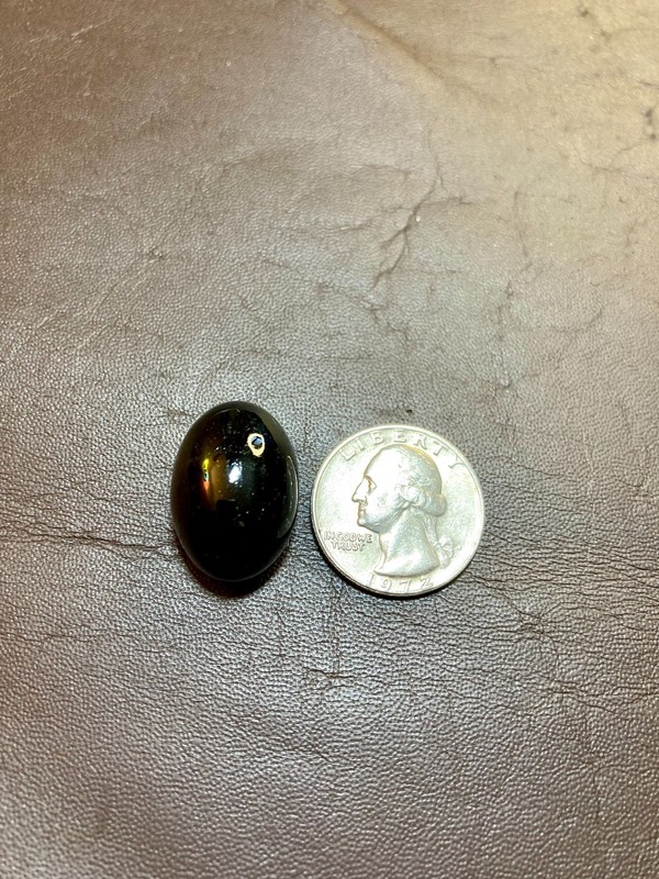 Hand Cut Oval Vietnamese Tektite Cabochon With Display Case