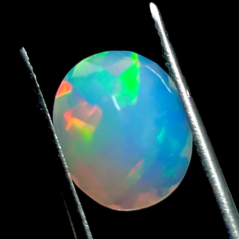 AAA+ Quality Faceted Ethiopian Opal 12.10x10x6.65-MM Oval Loose Gemstone (E-144) gallery