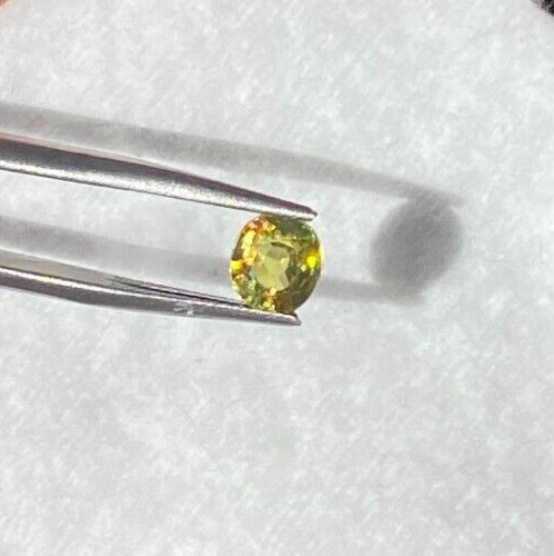 1.41 CTS, RARE LIME YELLOW SPHENE, 6.8 X 6 X 4 MM, CLEAN GEM, UNTREATED, RUSSIA