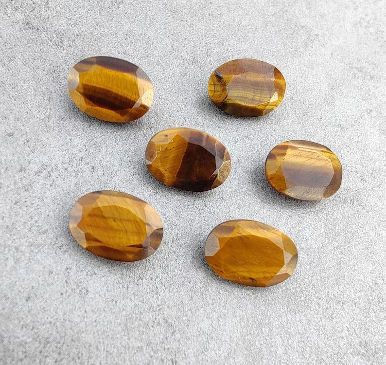 AAA+ Natural Top Quality Tiger Eye Faceted Oval Shape Loose Gemstone gallery
