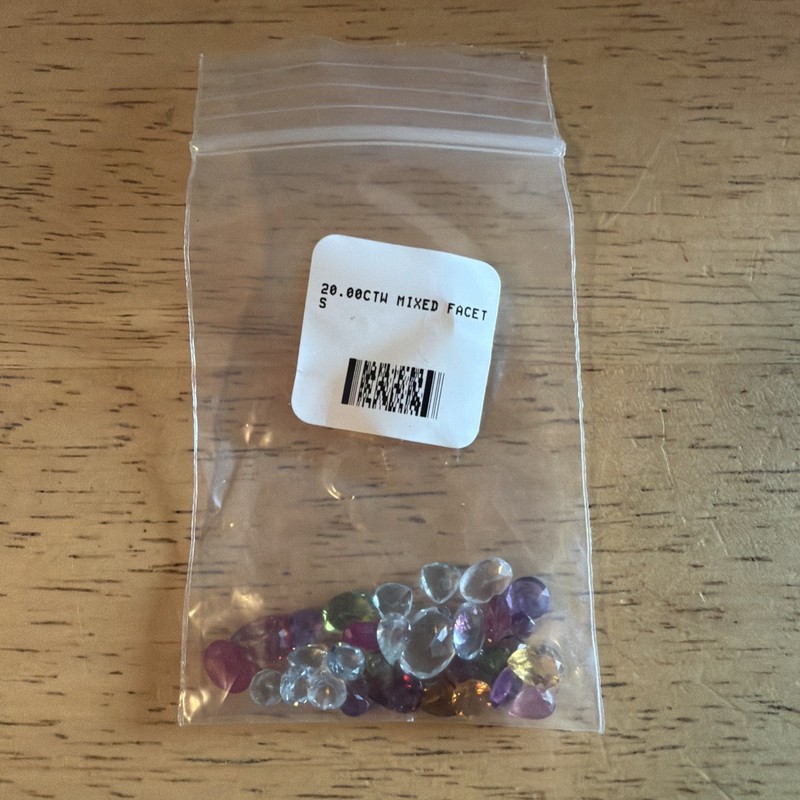 Lot Mixed Gemstones- Assorted Shapes/cuts/colors. New In Sealed Orig. Pkg