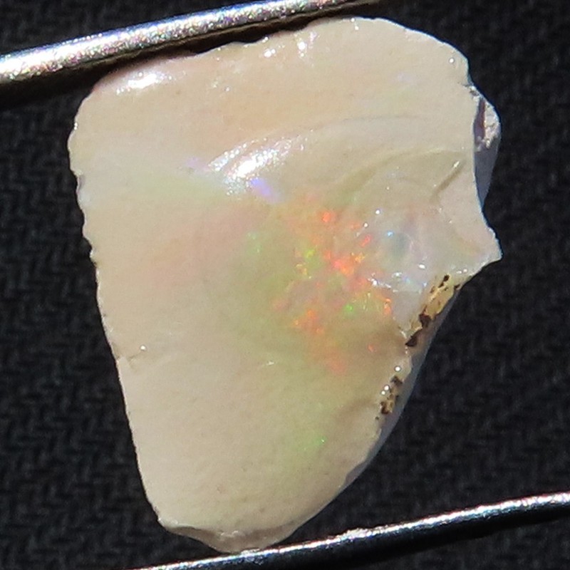 NATURAL PLAY OF COLOR ETHIOPIAN OPAL ROUGH GEMSTONE 3.95 Cts. (14x17x05 mm) M_08