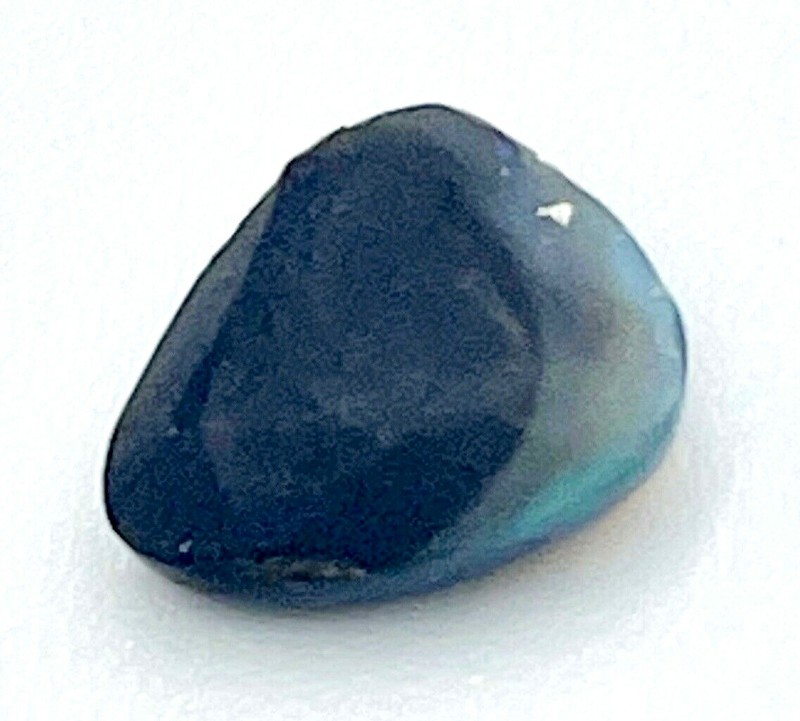 0.80ct natural solid Black Opal, origin Lightning Ridge Australia, 7.5mm x 6.6mm gallery