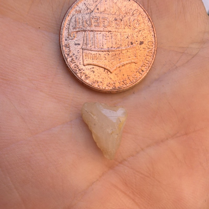white clear gemstone, could be raw white topaz or sapphire. Passed diam test gallery