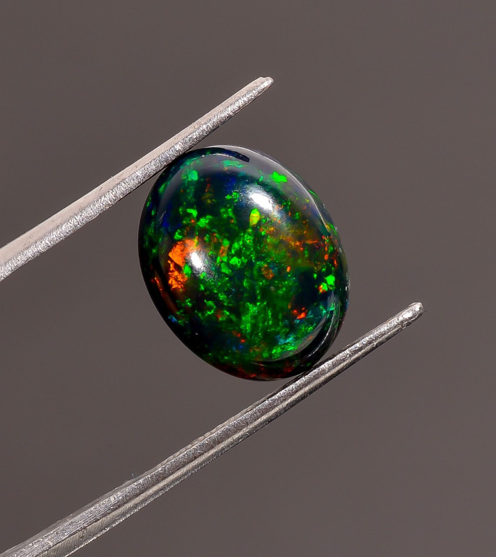 4.5 cts Natural Welo Fire Black Ethiopian Opal Oval Cabochon 13X10X6 mm