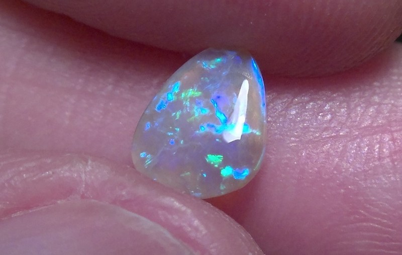0.57cts Solid Lightning Ridge crystal opal, stunning ice candy *see video*