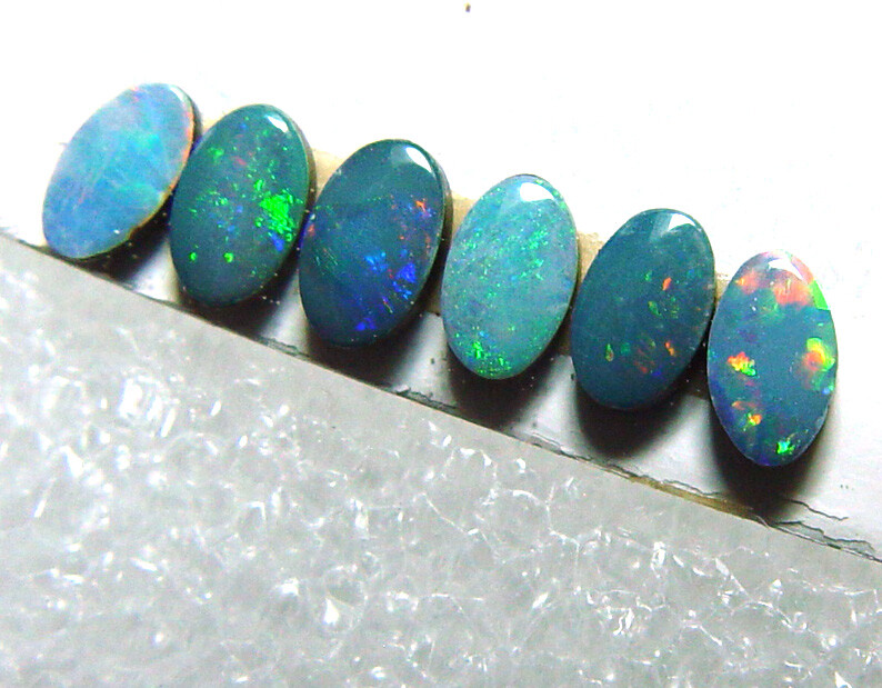 Set of 6 – 5 mm x 3 mm opal doublets, dark base, bright color flashes