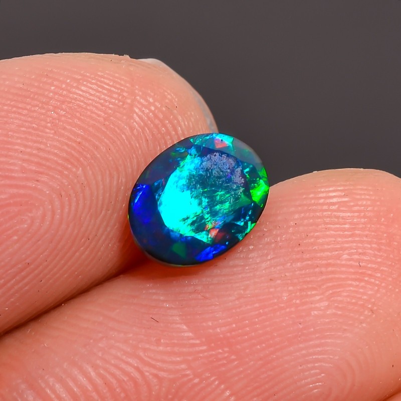 0.9 Ct Natural Black Ethiopian Opal Oval Shape Faceted Cut Gemstone 8X6X3 mm