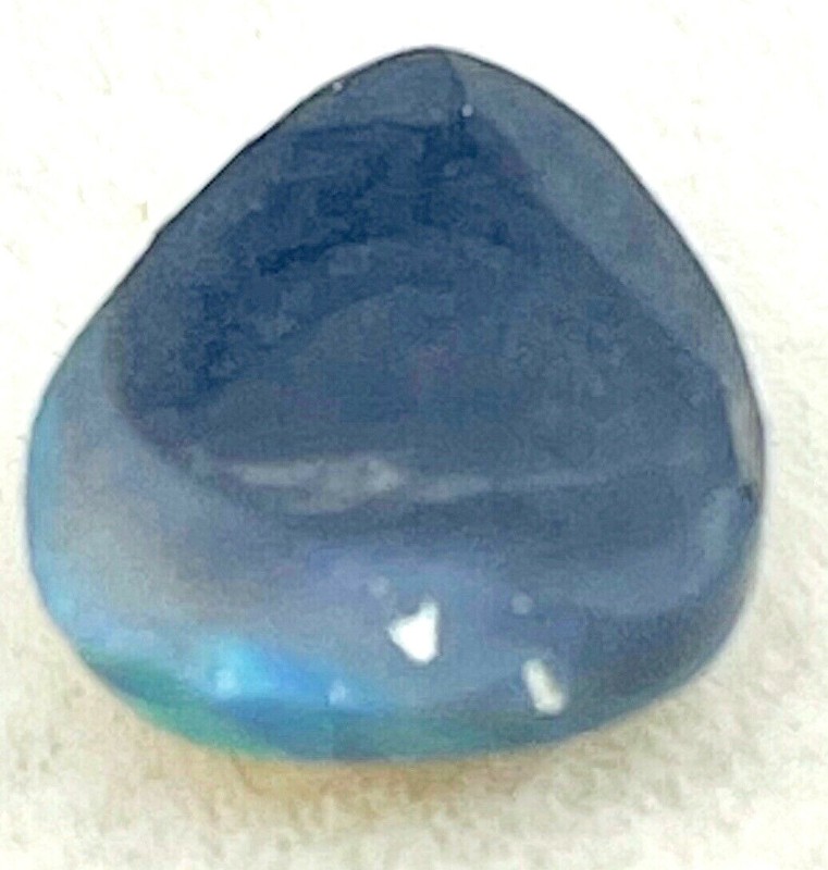 0.80ct natural solid Black Opal, origin Lightning Ridge Australia, 7.5mm x 6.6mm gallery