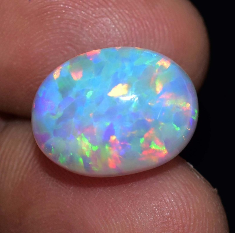 Natural Ethiopian Fire Opal 8.15 CT Certified Play Of Color 14 X 11 MM Gemstone gallery