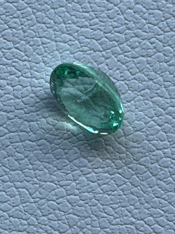 0.70 Carat, Bright Bluish Green 6 x 5mm Oval. Copper Bearing PARAIBA TOURMALINE gallery