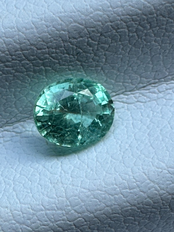 0.70 Carat, Bright Bluish Green 6 x 5mm Oval. Copper Bearing PARAIBA TOURMALINE gallery