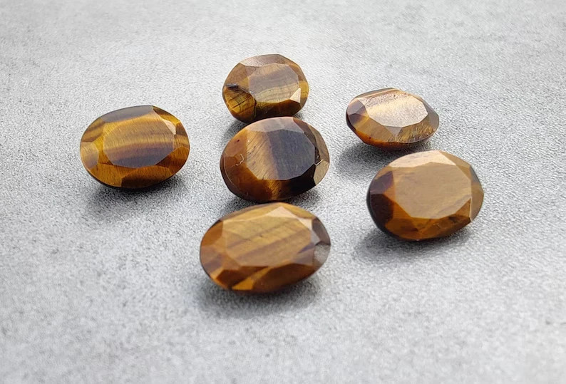 AAA+ Natural Top Quality Tiger Eye Faceted Oval Shape Loose Gemstone gallery