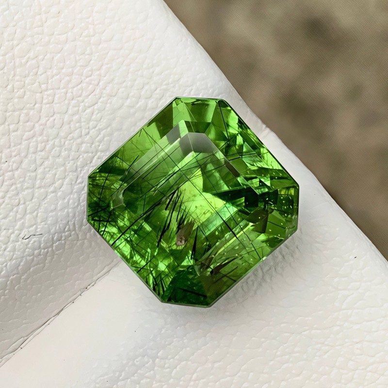 11.07 Carats Natural Ludwigite Inclusion Peridot Emerald Cut From Pakistan