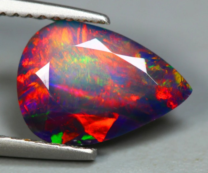 Extreme Grade Solid Faceted Opal 1.27 ct 11.3 X 8.2mm