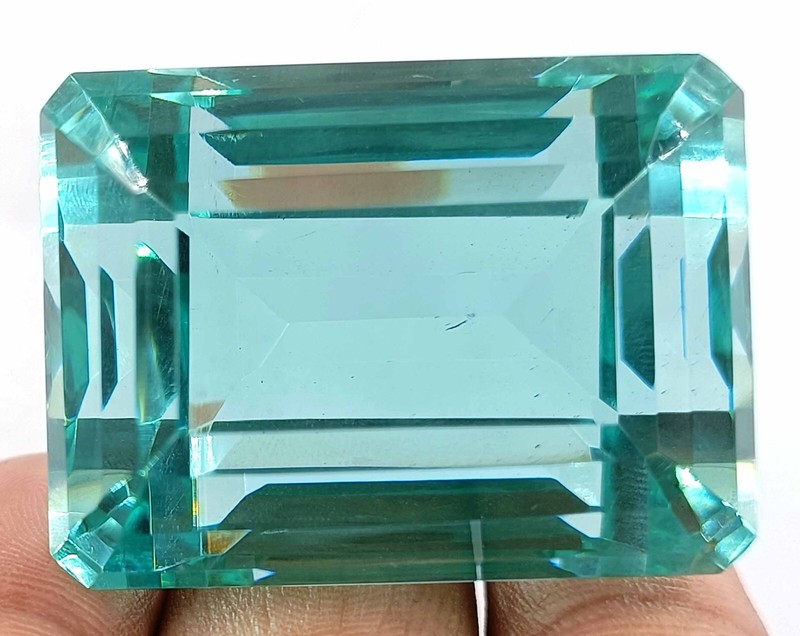 210 CARAT GLAMOROUS NEON BLUE APATITE EGL CERTIFIED EMERALD CUT LOOSE GEMSTONE gallery